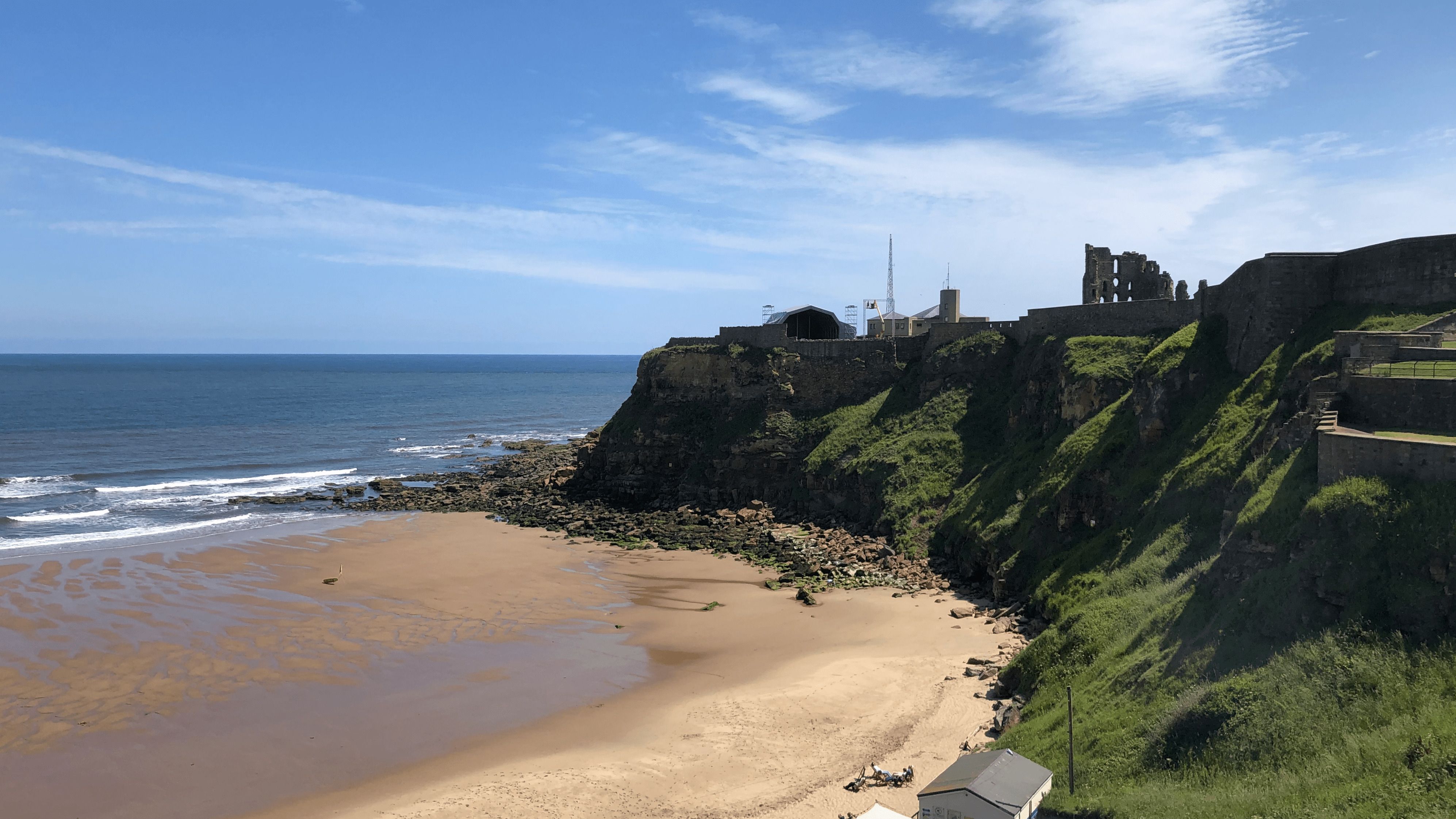 Tynemouth Priory and Longsands during summer.